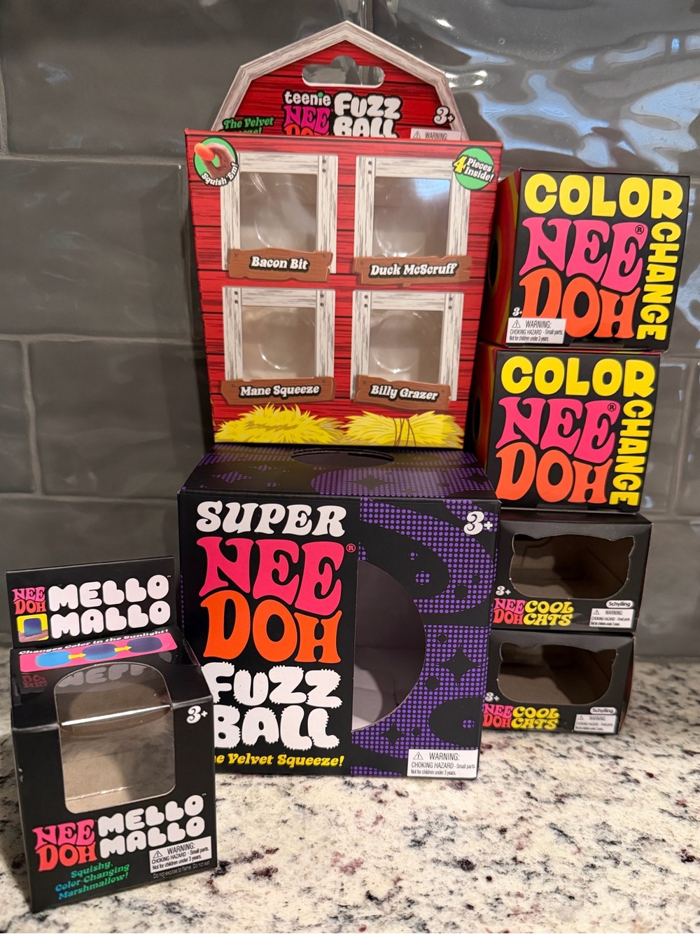 Super Nee Doh Fuzz Ball Display - Black & Purple Packaging